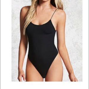 Seamless ribbed thong body suit